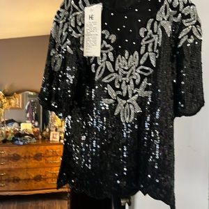 Beaded shirt has sequins, beating, sheer rhinestones just absolutely gorgeous